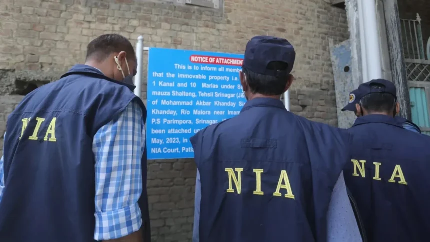 NIA officials examine digital evidence and documents during Delhi blast terror probe