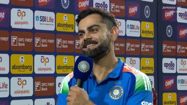Virat Kohli celebrating a historic milestone in international cricket